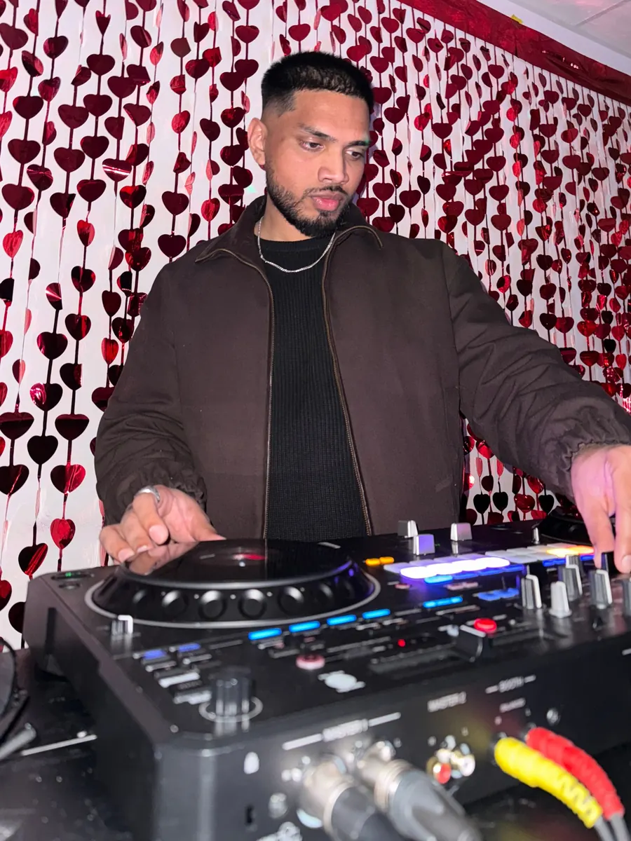 DJ Shadzy performing at a themed celebration