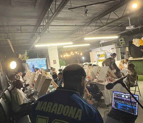DJ Shadzy performing for a full room at a private event